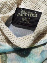 Load image into Gallery viewer, Close-up of Jean Paul Gaultier blue mesh top showing brand labe and SIgnature Jean Paul Gaultier seam construction